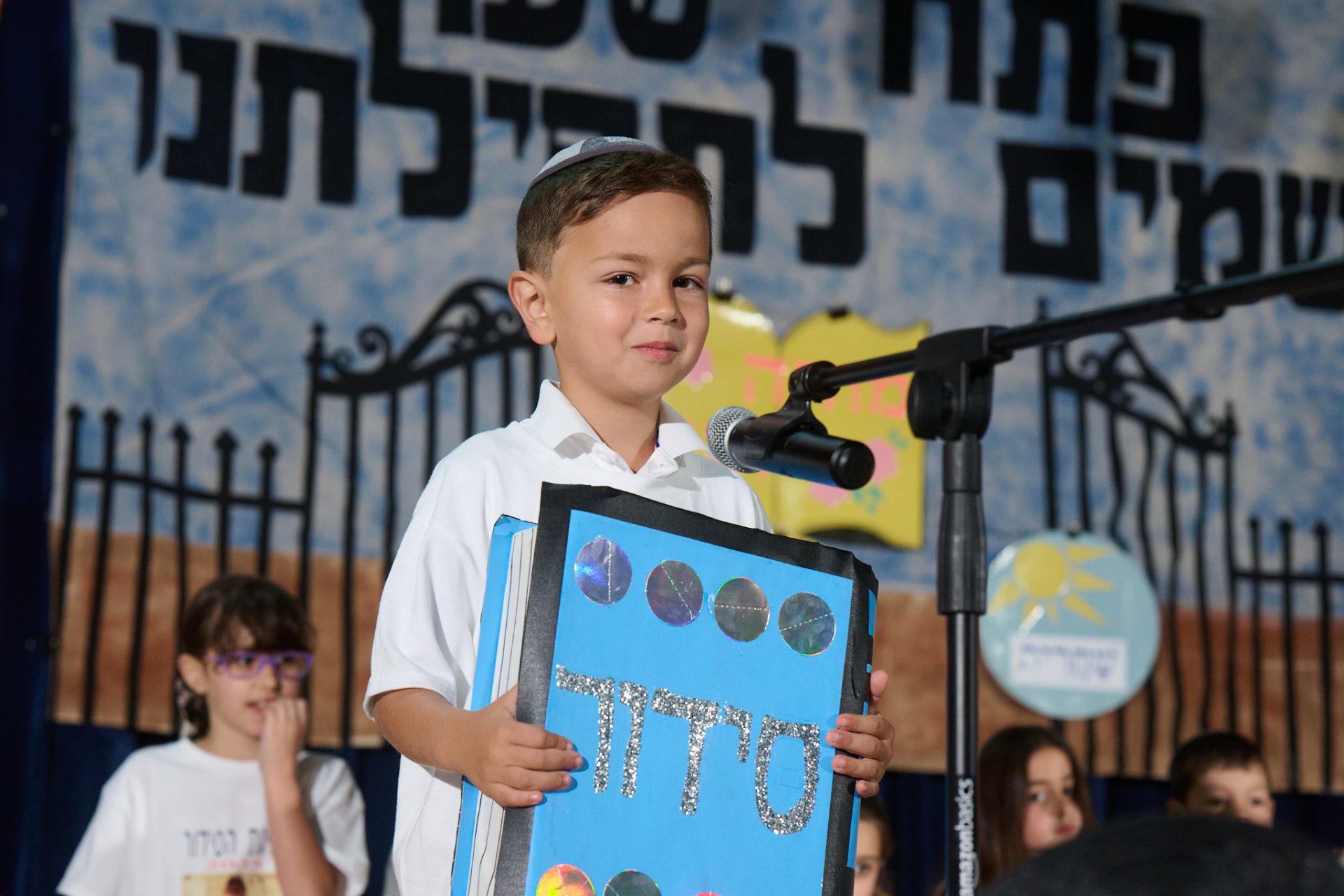 First Graders Receive Their First Siddur